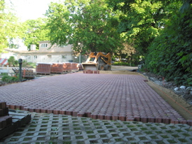 Installation of Ecoloc porous pavers in front of the house